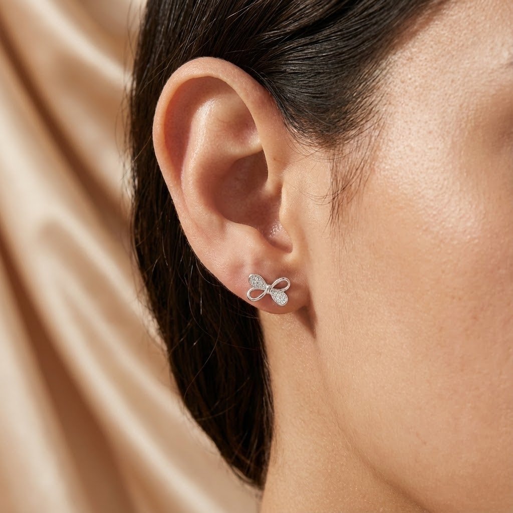 Brinco Borboleta Vazada e Zirconia